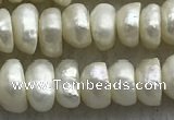 FWP321 14.5 inches 5mm - 6mm button white freshwater pearl strands