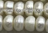 FWP322 15 inches 6mm - 7mm button white freshwater pearl strands