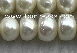 FWP323 15 inches 7mm - 8mm button white freshwater pearl strands